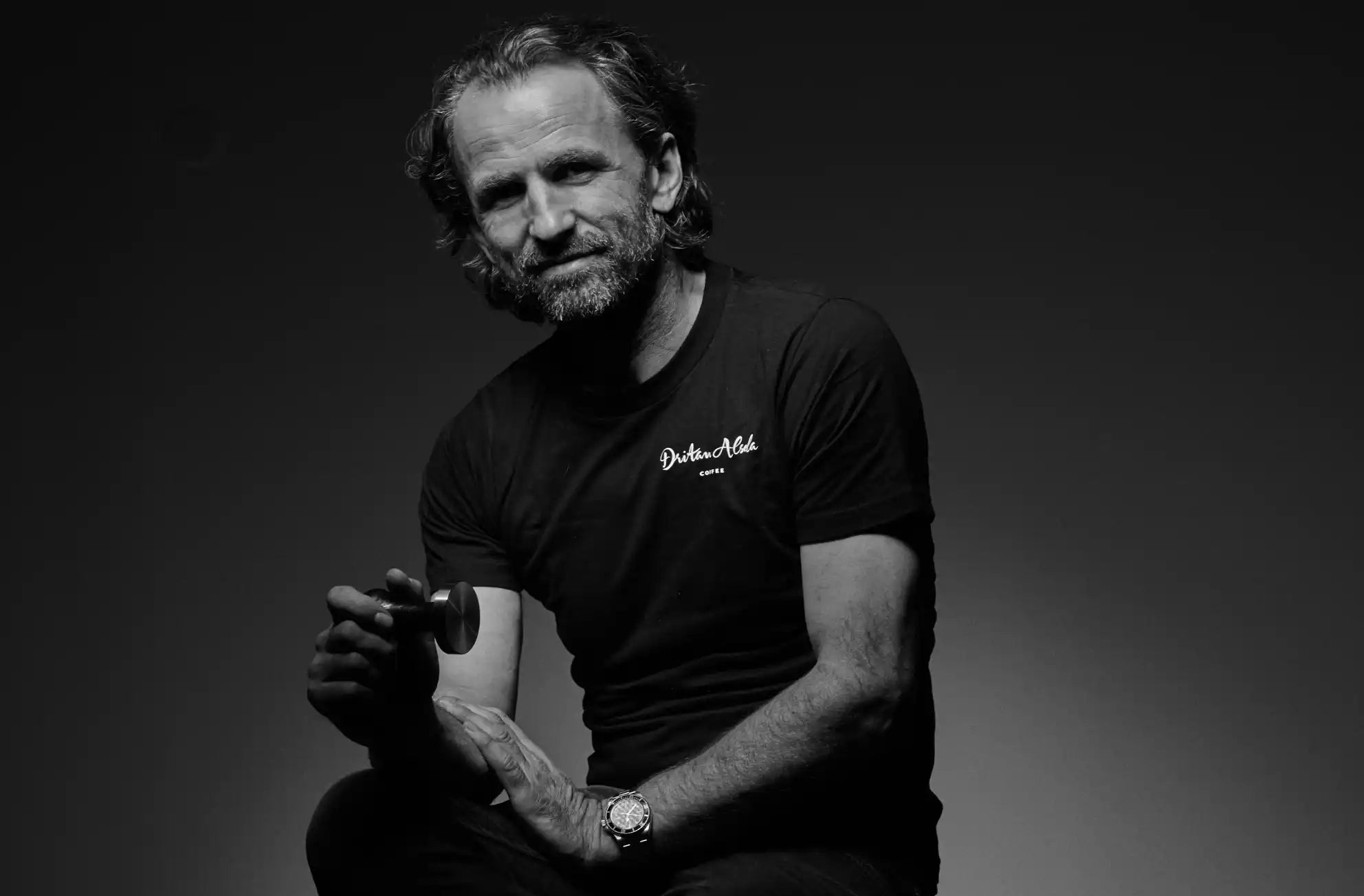 Bearded man in a t-shirt.