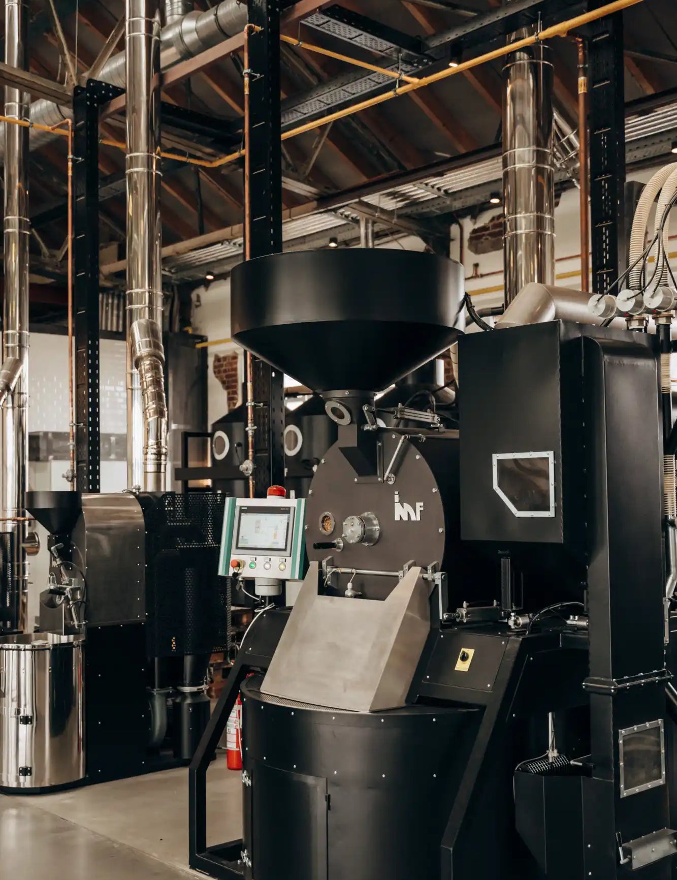 Industrial coffee roasting machine.