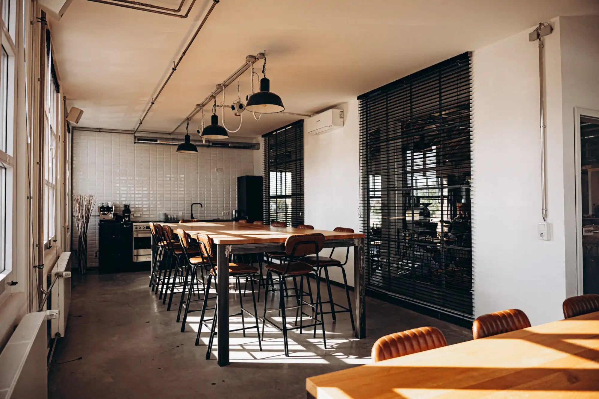 Wooden bar stool with leather seat and metal frame, dark brown color.